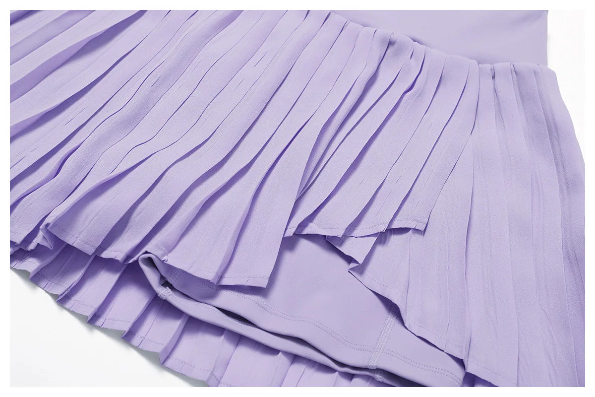 Light purple pleated skirt with layered fabric detail, close-up view
