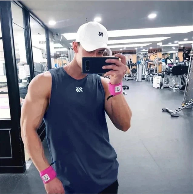 Stay cool and dry with this 2024 men's fitness gym tank top. A breathable mesh, sleeveless workout shirt—perfect for training, running, or gym sessions.

