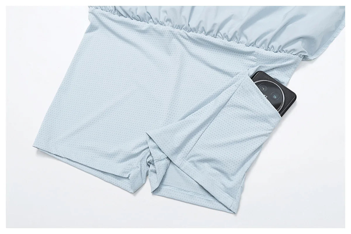 Light blue athletic shorts with phone pocket, perforated breathable fabric, flat lay